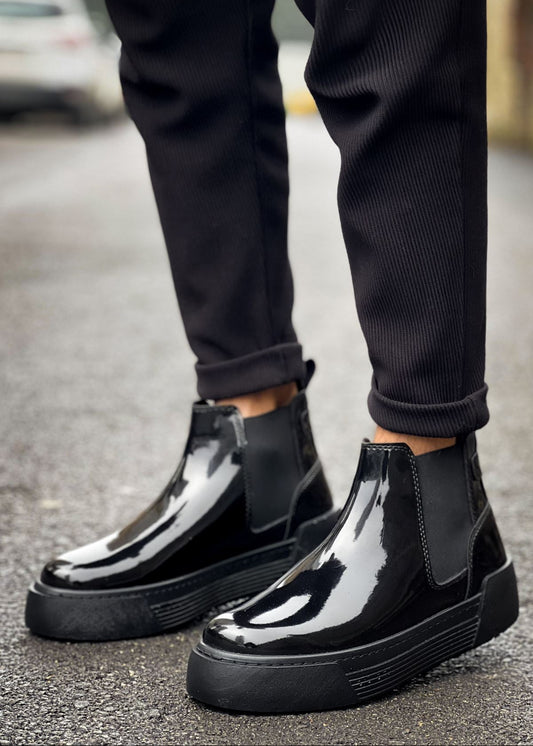 Avalon Patent Onyx Chelsea boot in black patent by Apollo Moda, worn with black trousers