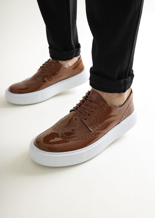 Empoli Earthy Luxe dress shoe in brown by Apollo Moda, styled with black trousers