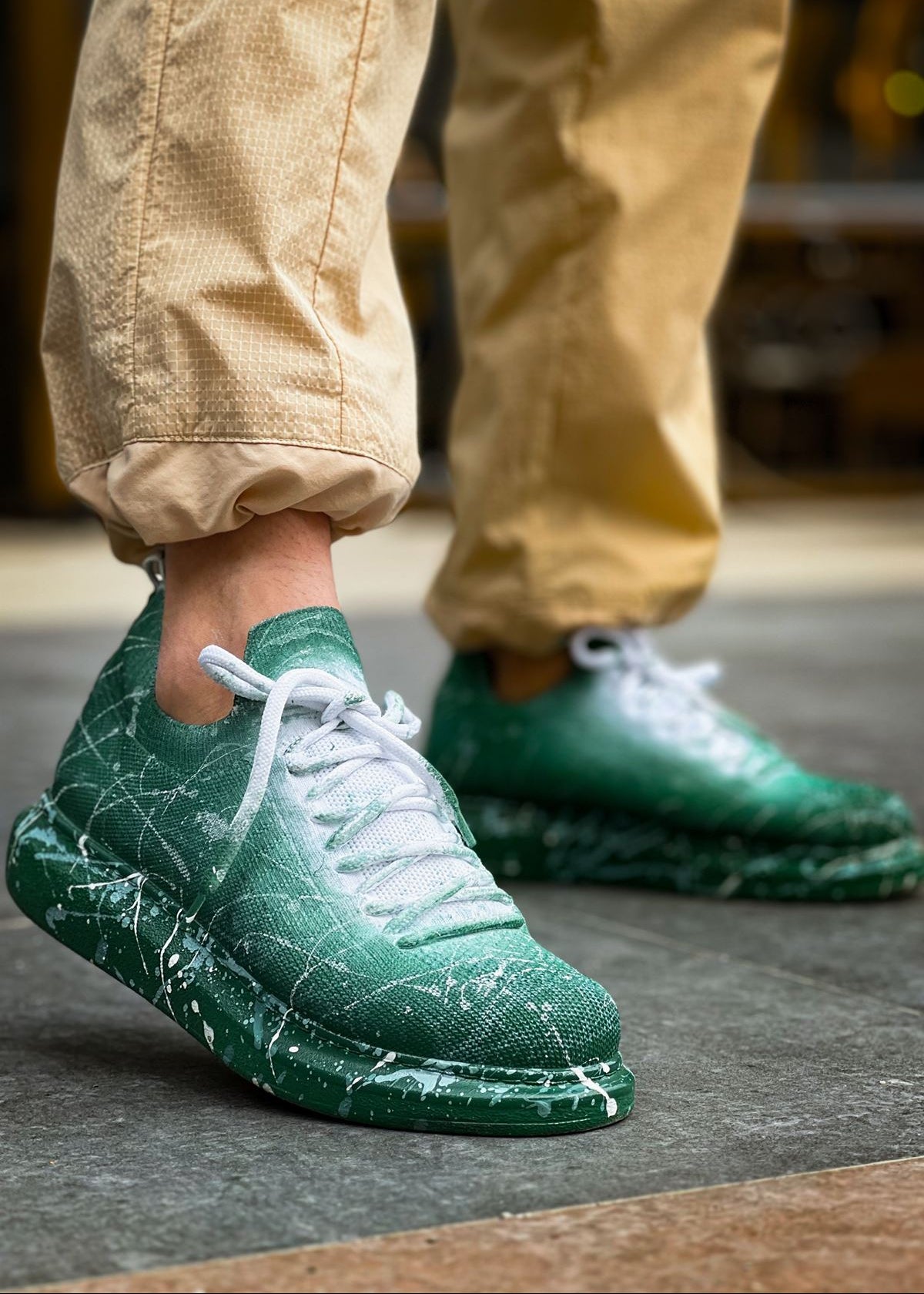 Torino Verdant Surge knit sneaker in green with white splatter design by Apollo Moda