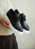 Men's Vantage Apex by Apollo Moda, black sneaker with bold white elevated sole, second angle